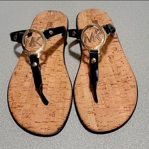 Michael Kors jelly sandals.